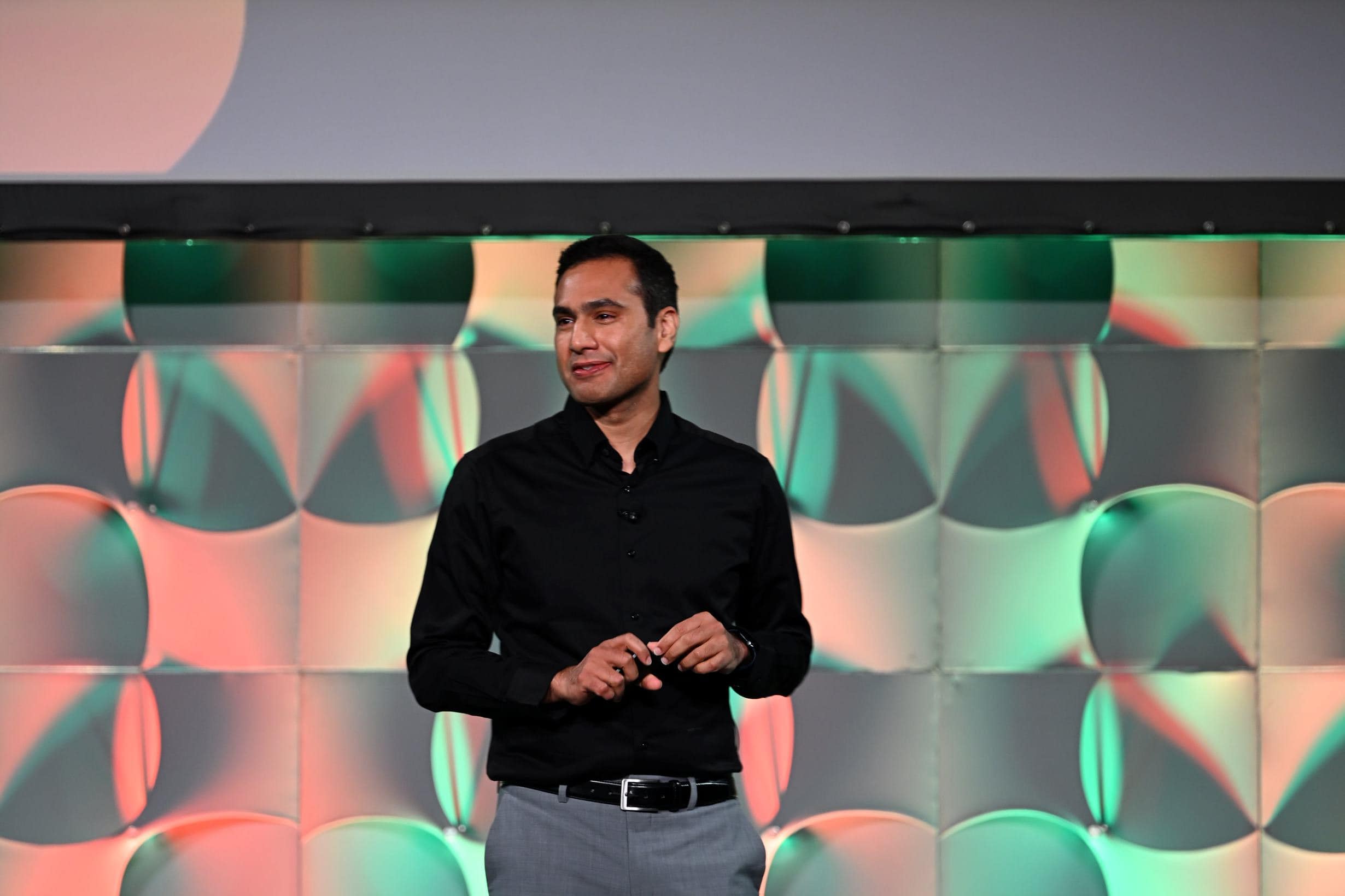A person in a black shirt
Description automatically generated